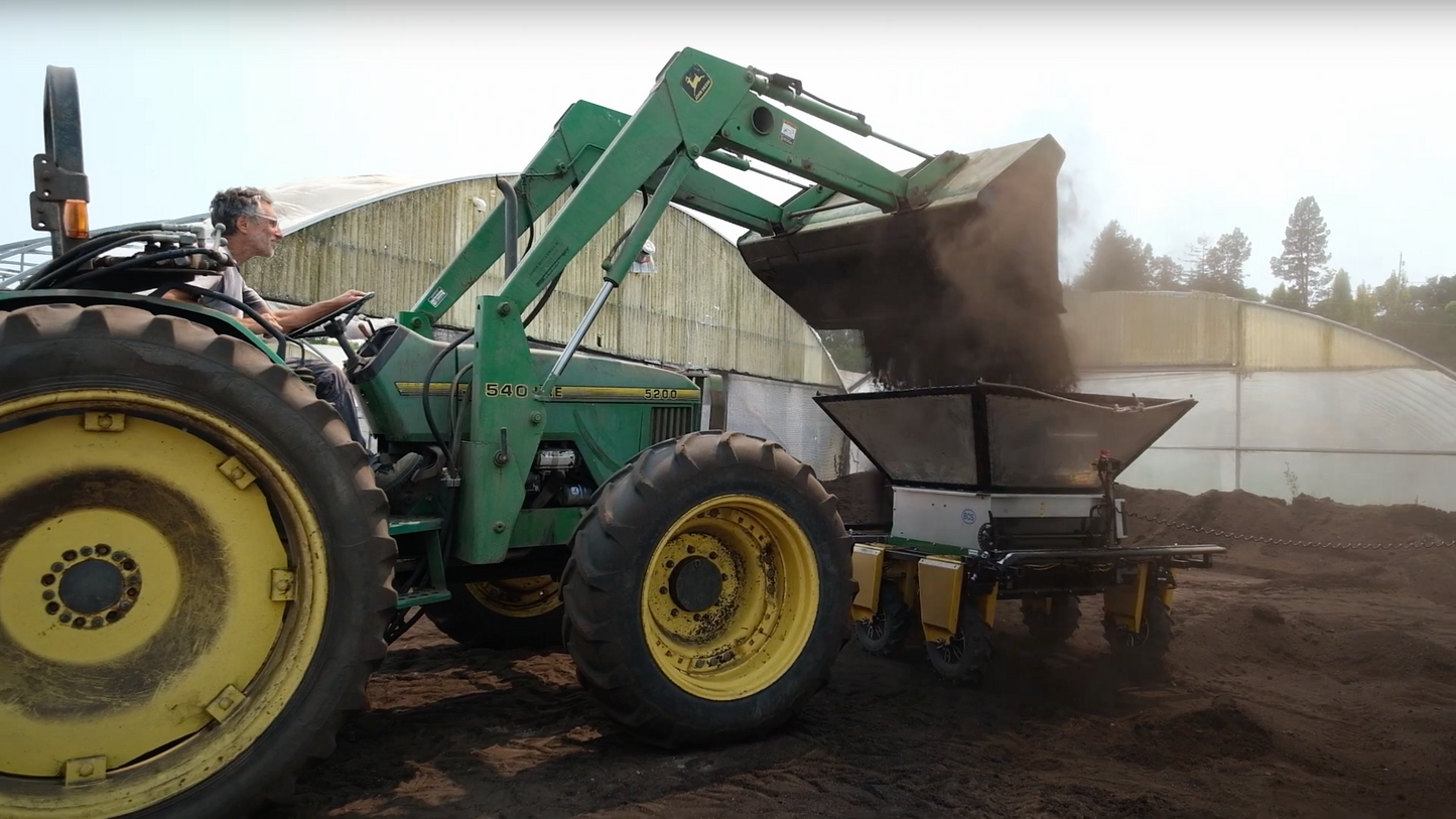 Integrated Compost Spreader Assembly